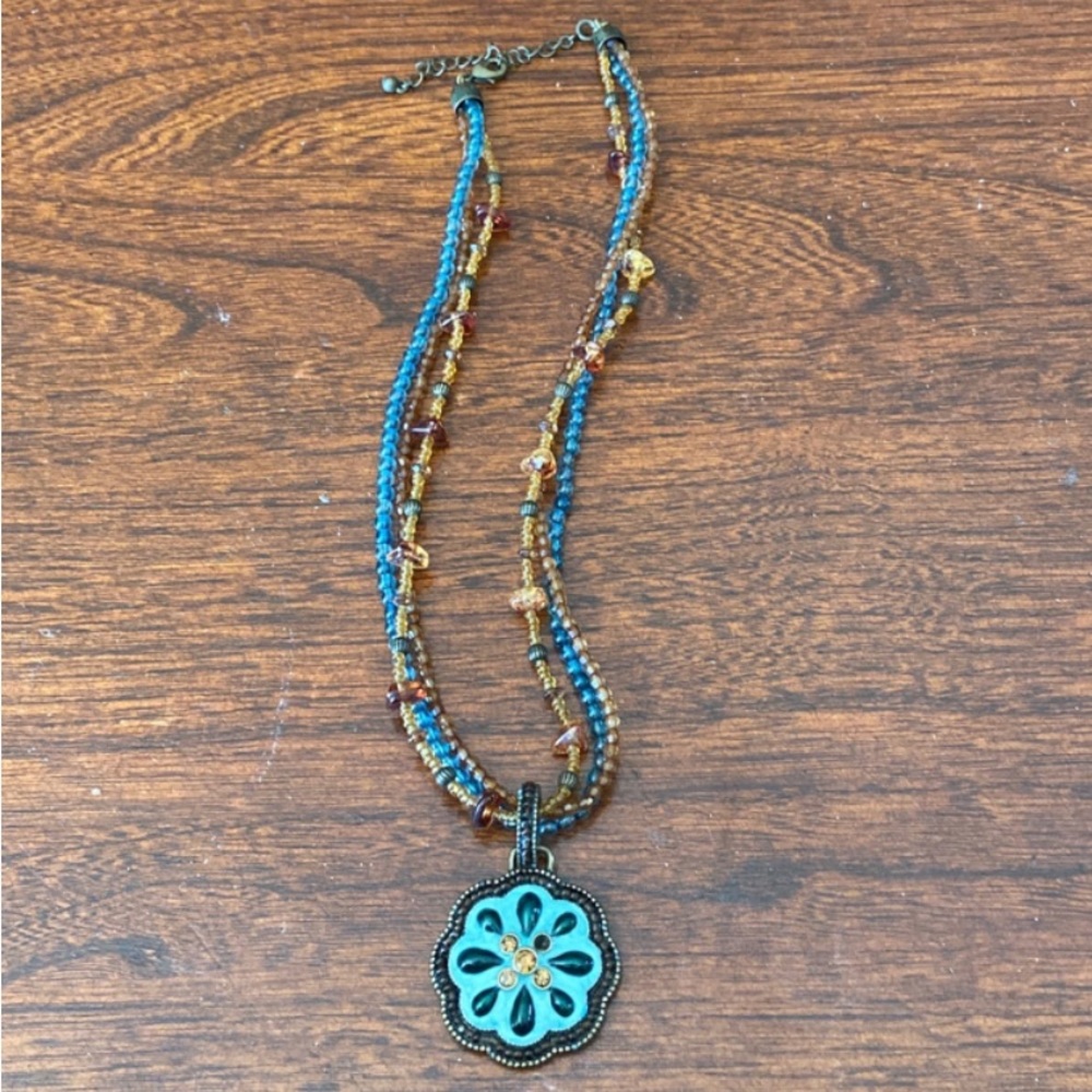 Turquoise and brown necklace with pendant